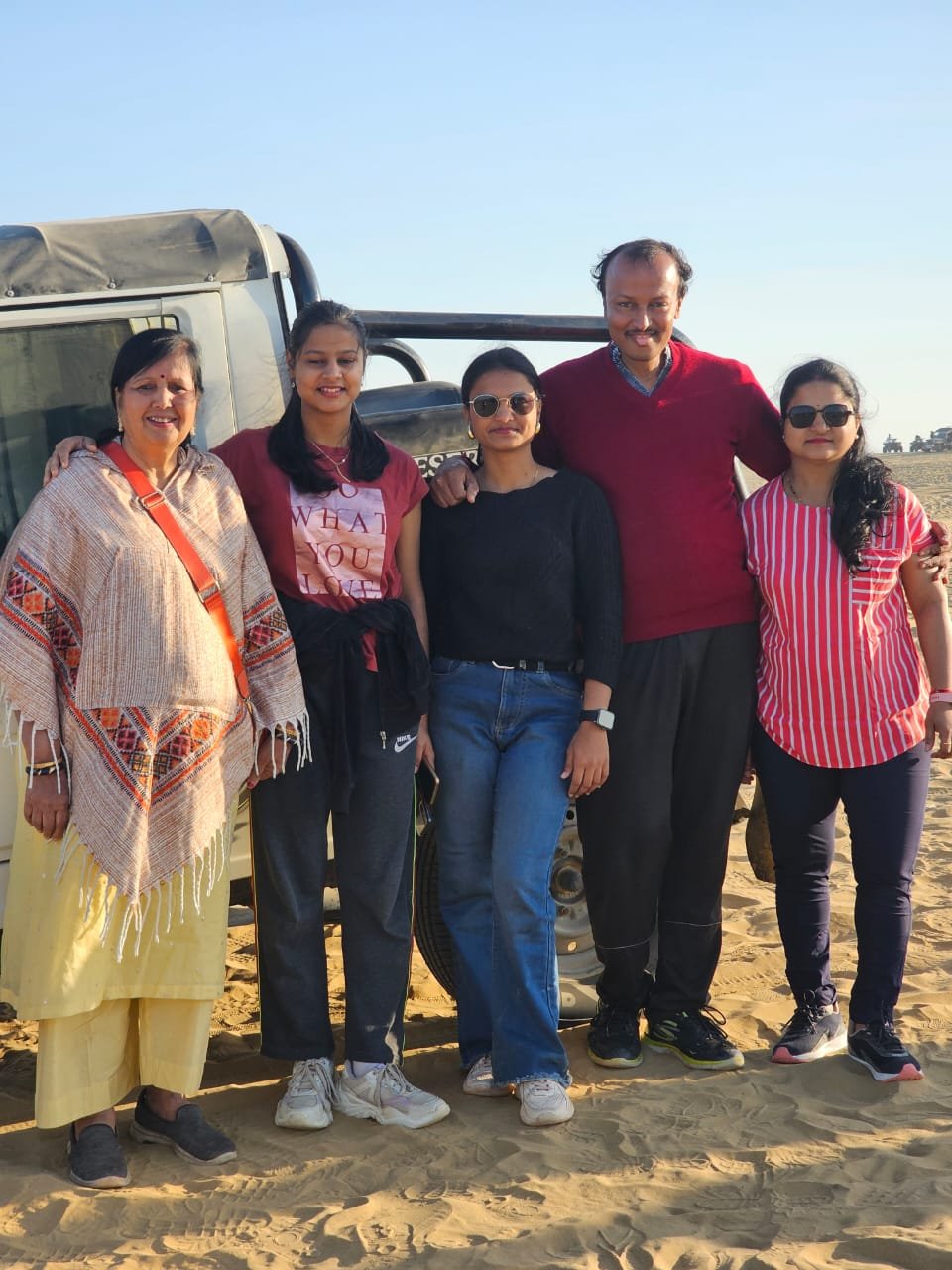Group enjoying Jaisalmer sand dunes and desert safari