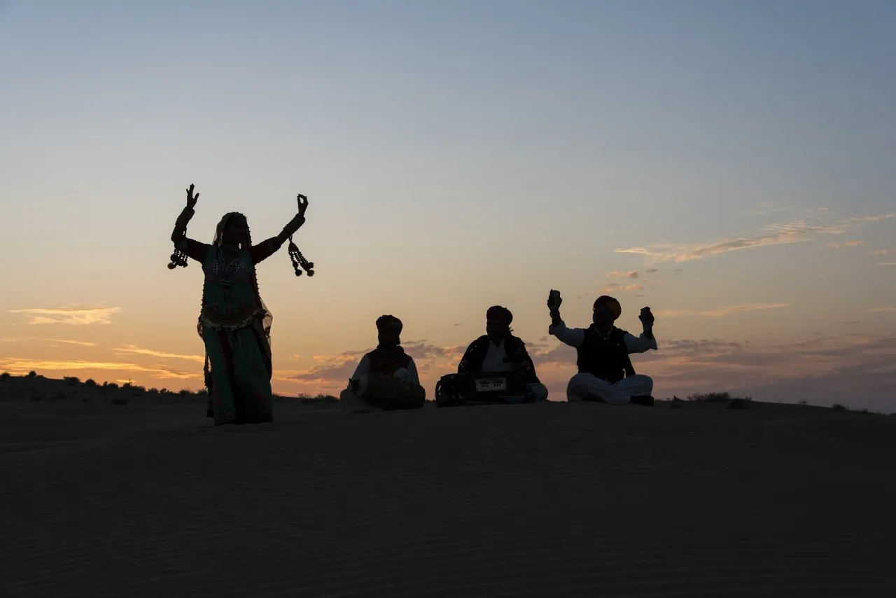 Folk dance at romantic desert camp